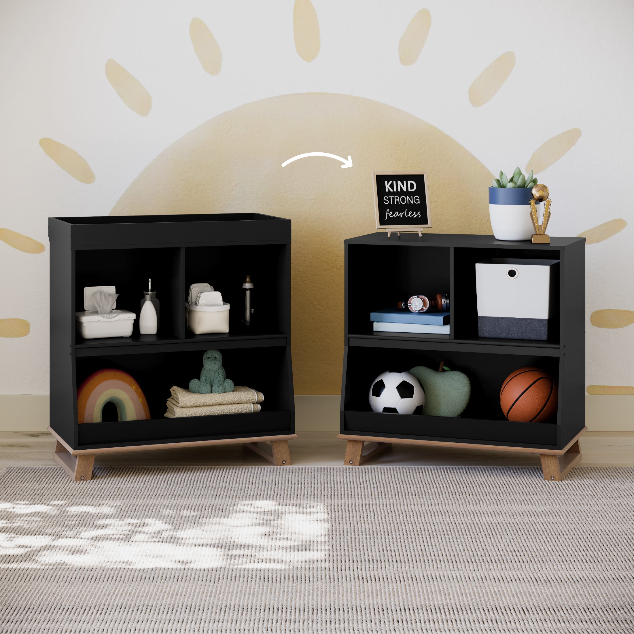 two modern convertible black with vintage driftwood changing tables in nursery, left one with topper and right one without topper 