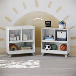 two modern convertible white with pebble gray changing tables in nursery, left one with topper and right one without topper 