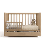 Storkcraft Malta 5-in-1 Convertible Crib with Drawer.