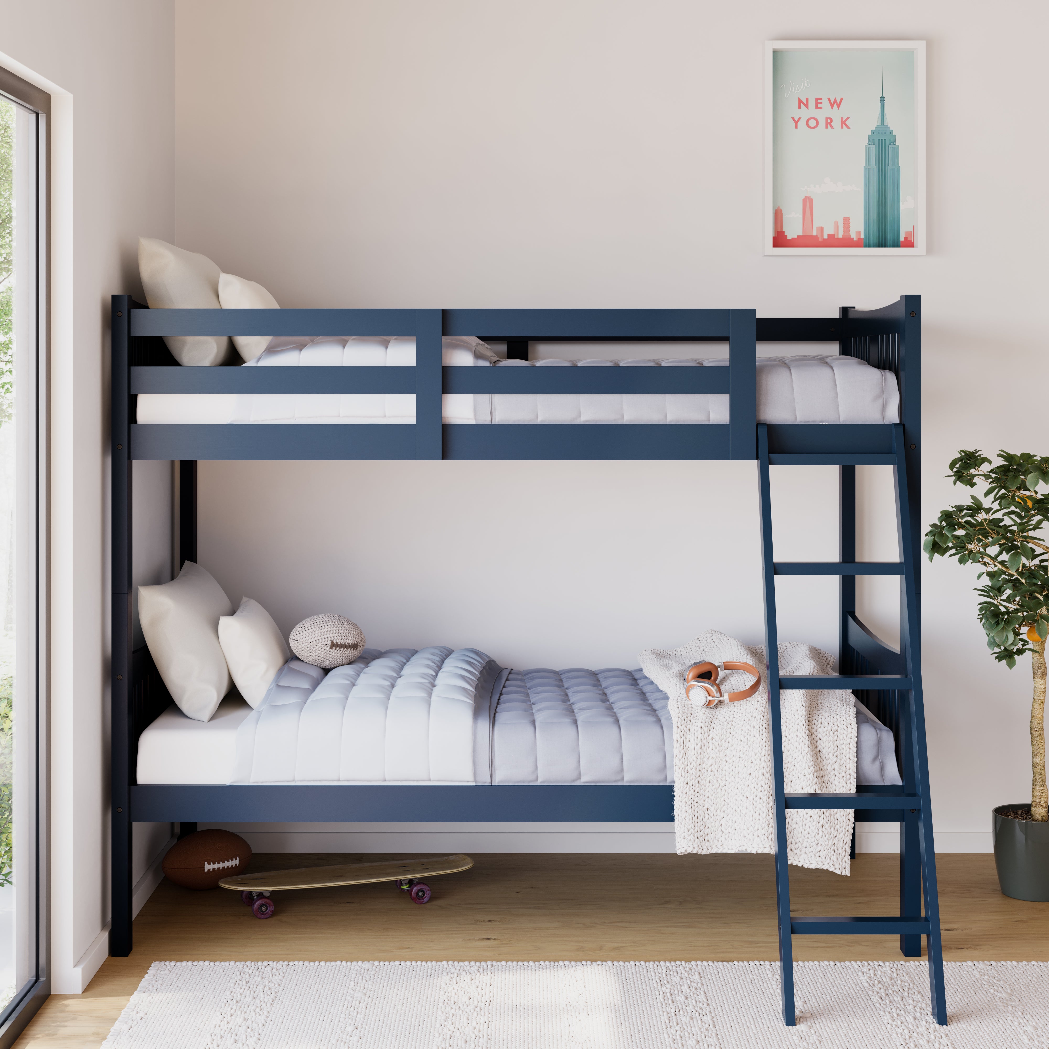navy bunk bed with fixed ladder in nursery 