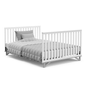 white with pebble gray crib in full-size bed conversion with both headboard and footboard