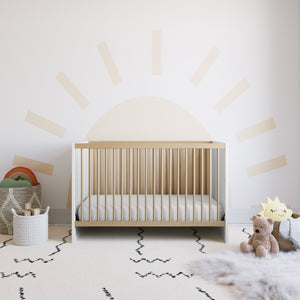 white with driftwood crib in nursery