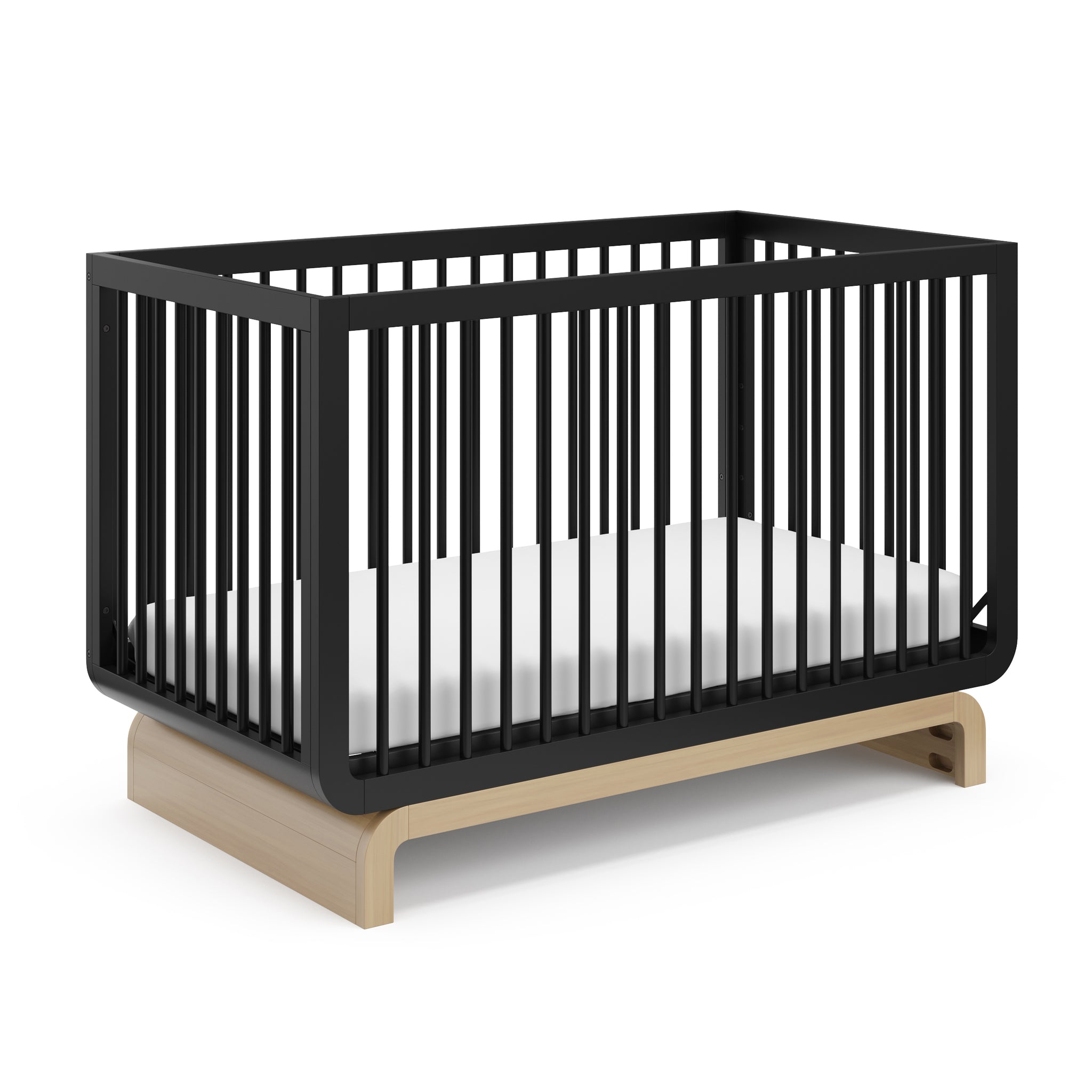 Baby crib in two-tone black and natural wood colorway, at an angle