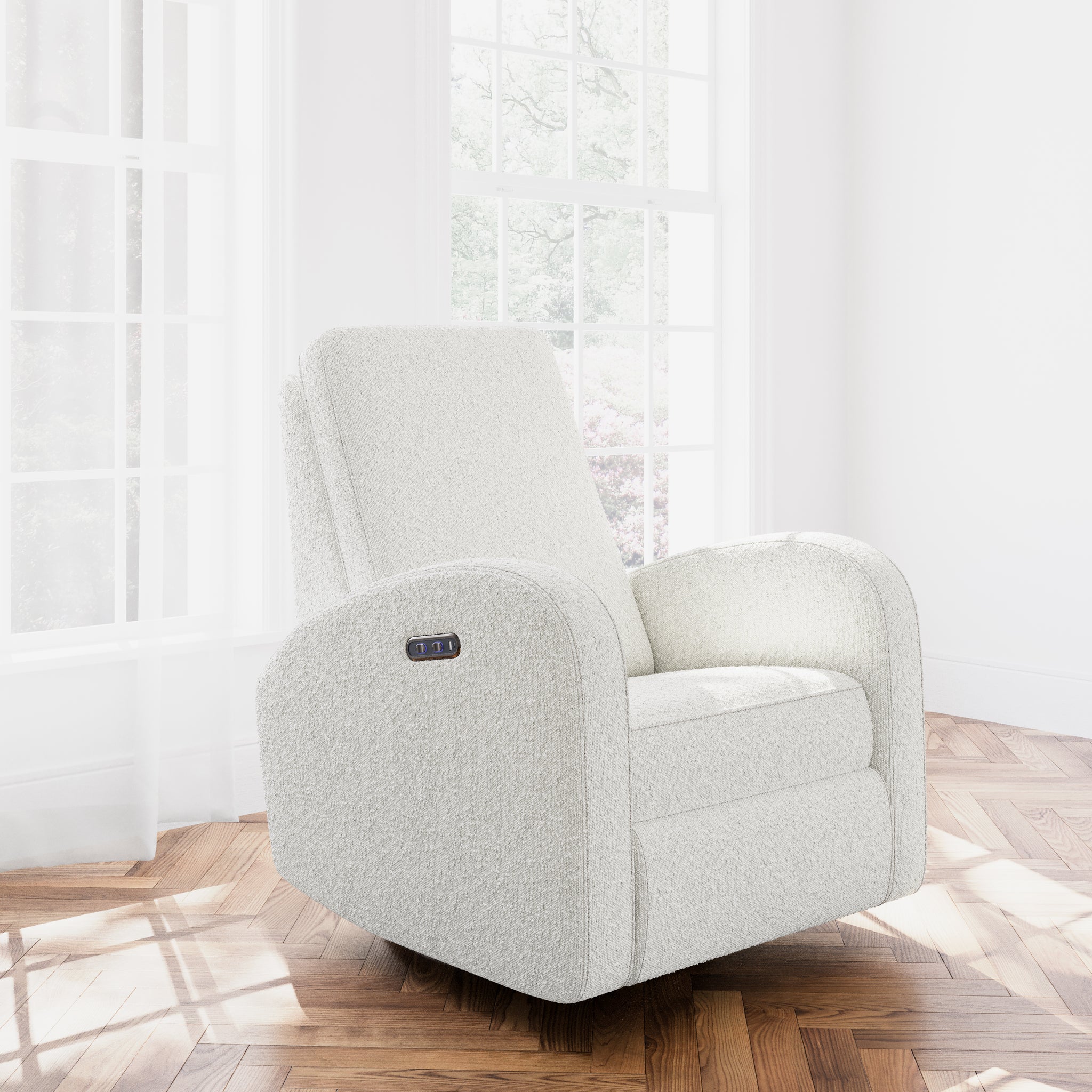 White upholstered chair in room setting on hardwood floor