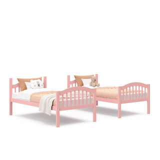 two pink separate twin-size beds