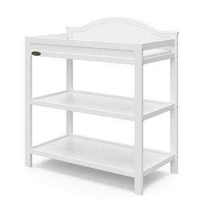 White angled changing table with storage