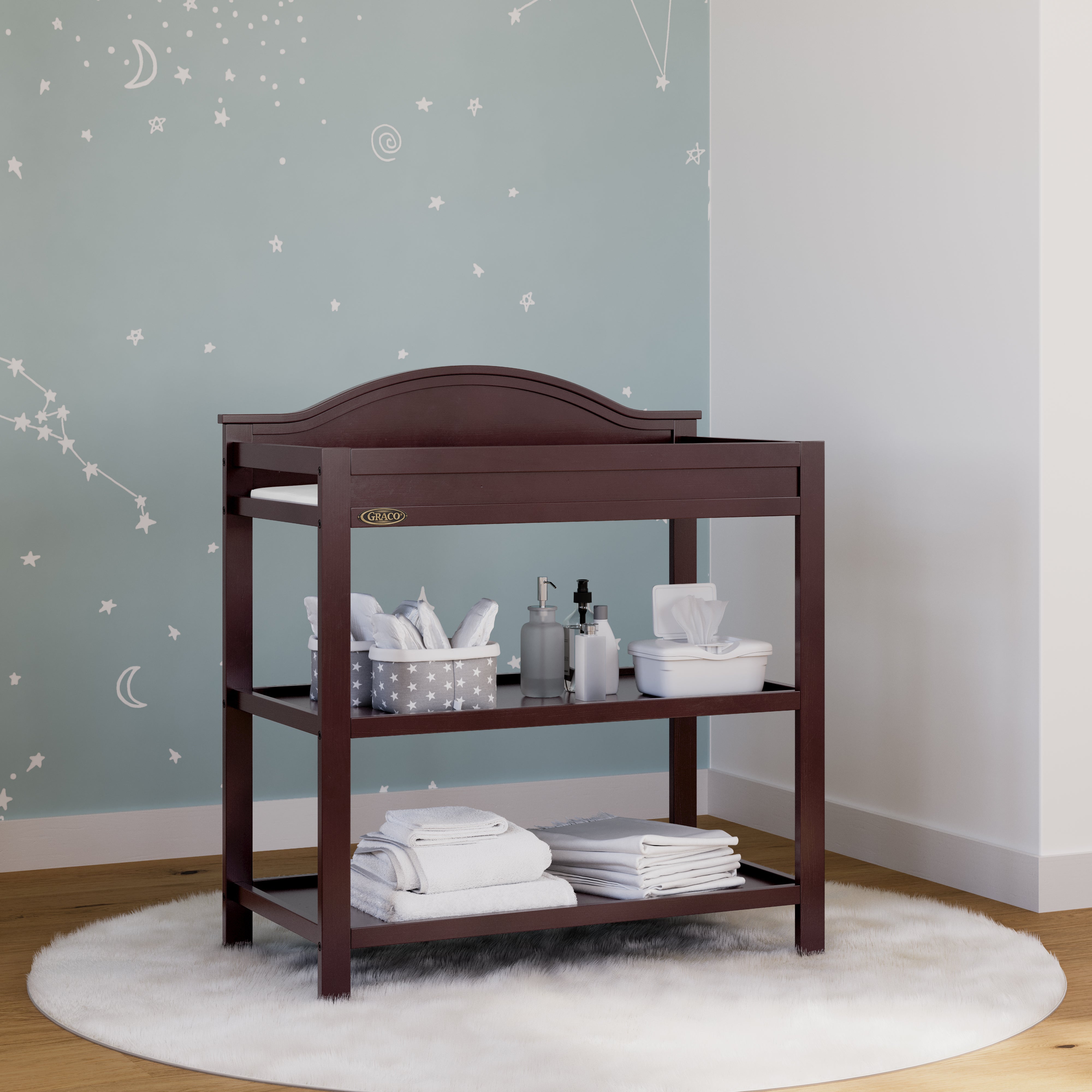 Graco® Story Changing Table with Bonus Water-Resistant Changing Pad.