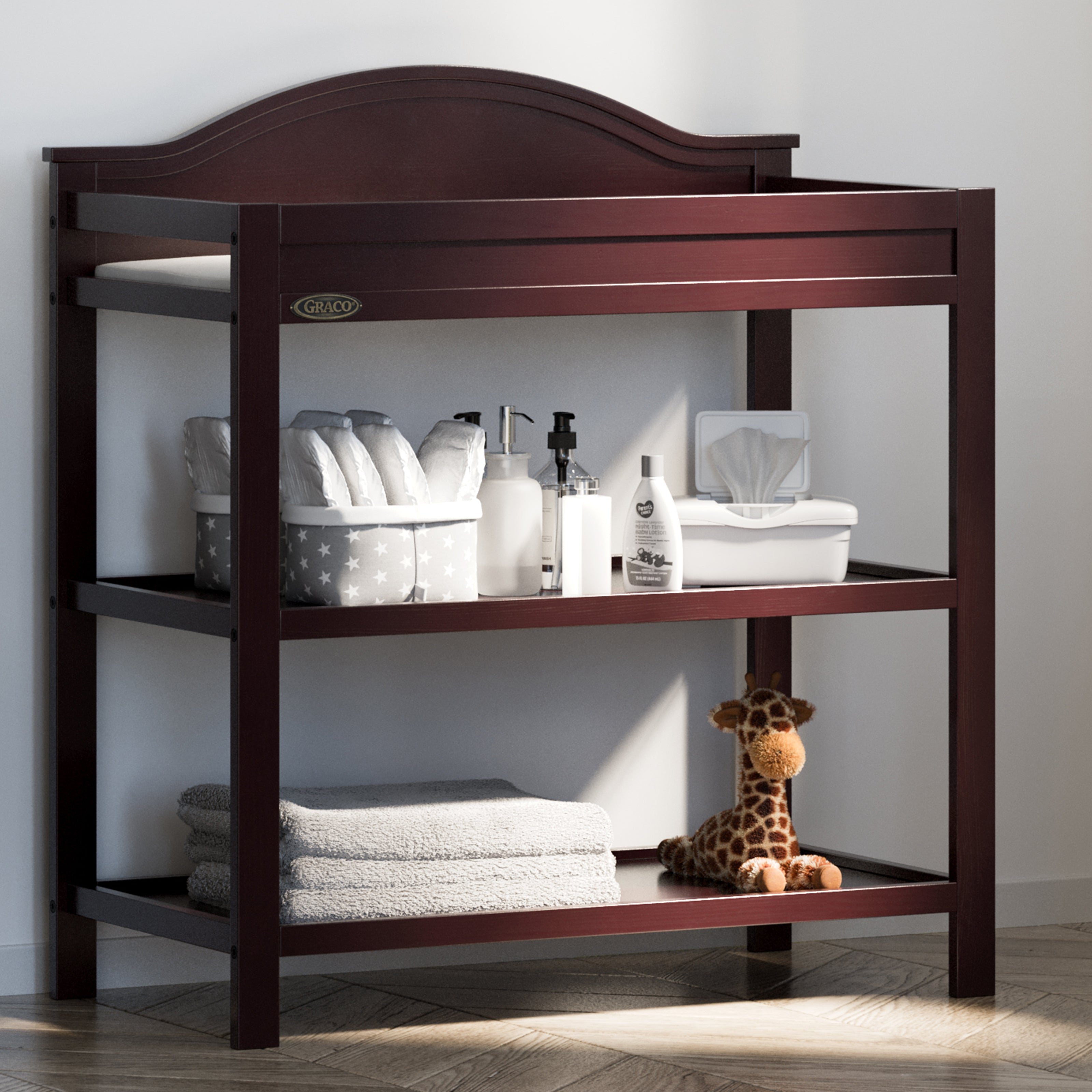 Graco® Story Changing Table with Bonus Water-Resistant Changing Pad.