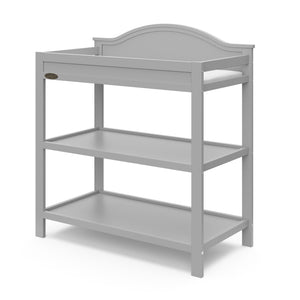 Pebble gray angled changing table with two open shelves