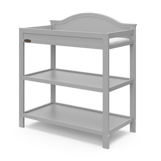 Pebble gray angled changing table with two open shelves