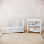 Graco® Teddi® Changing Table with Bonus Water-Resistant Changing Pad.