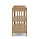 Graco® Teddi® Changing Table with Bonus Water-Resistant Changing Pad.