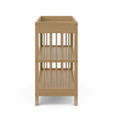 Graco® Teddi® Changing Table with Bonus Water-Resistant Changing Pad.