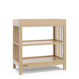 Graco® Teddi® Changing Table with Bonus Water-Resistant Changing Pad.