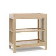 Teddi® Changing Table with Bonus Water-Resistant Changing Pad