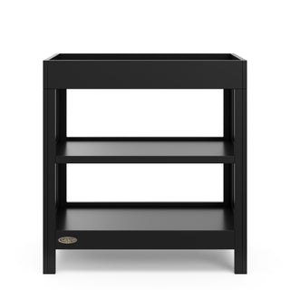 front view of black changing table with two shelves