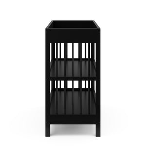 side view of black changing table with two shelves