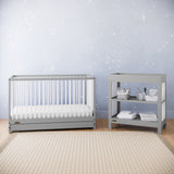 Graco® Teddi® Changing Table with Bonus Water-Resistant Changing Pad.