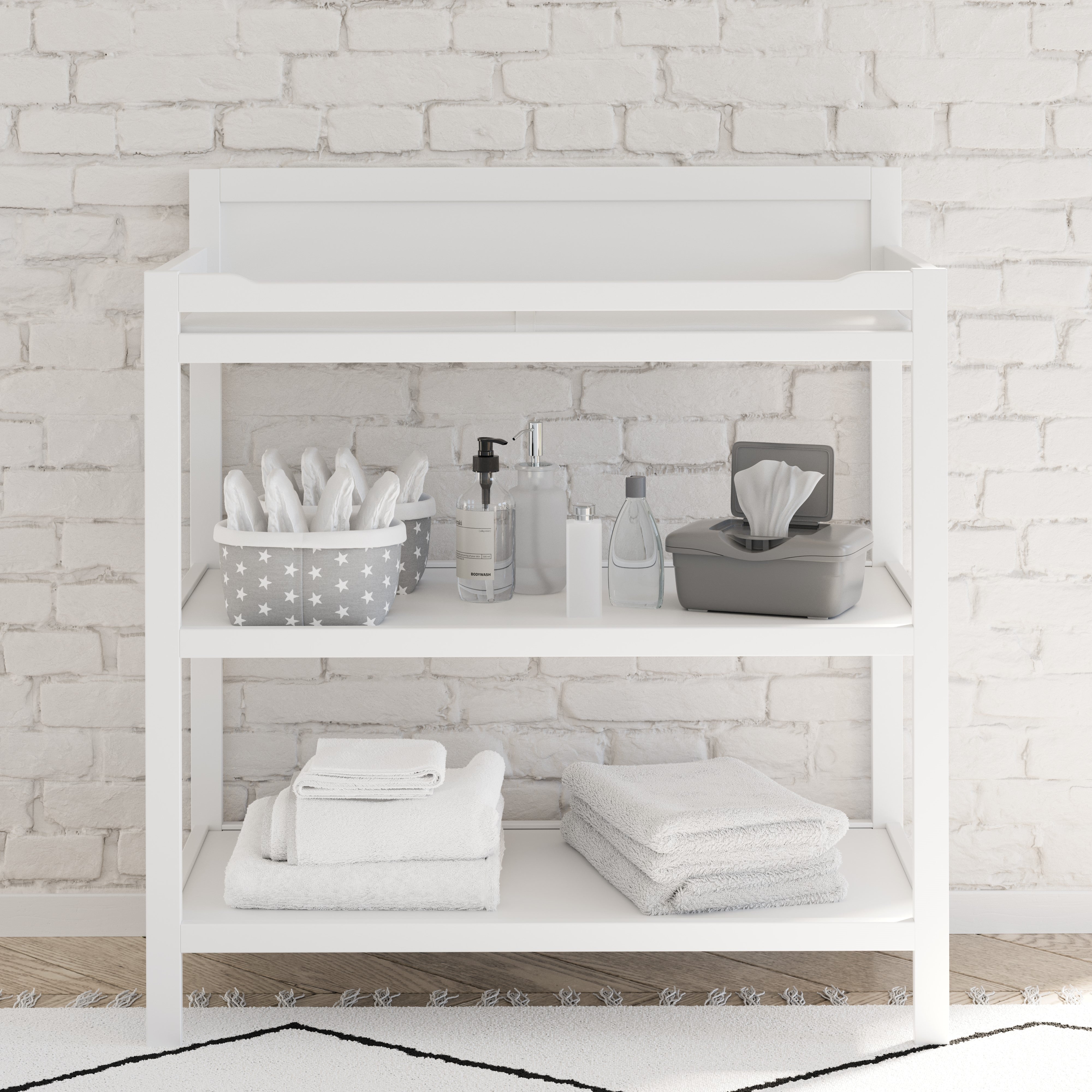 Storkcraft® Alpine Changing Table with Bonus Water-Resistant Changing Pad.