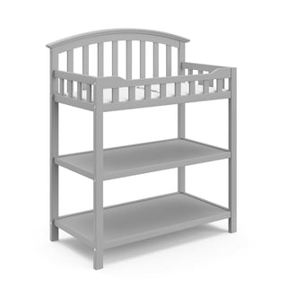 Pebble gray angled changing table with two open shelves