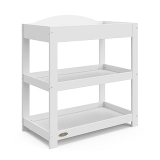white angled changing table with removable headboard and two open shelves
