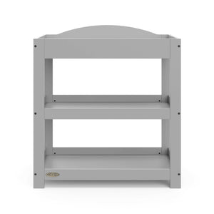 Front view of Pebble gray changing table with removable headboard and two open shelves