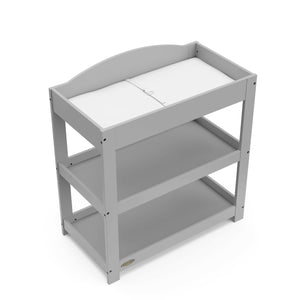 Bird’s-eye view of Pebble gray changing table with removable headboard and two open shelves