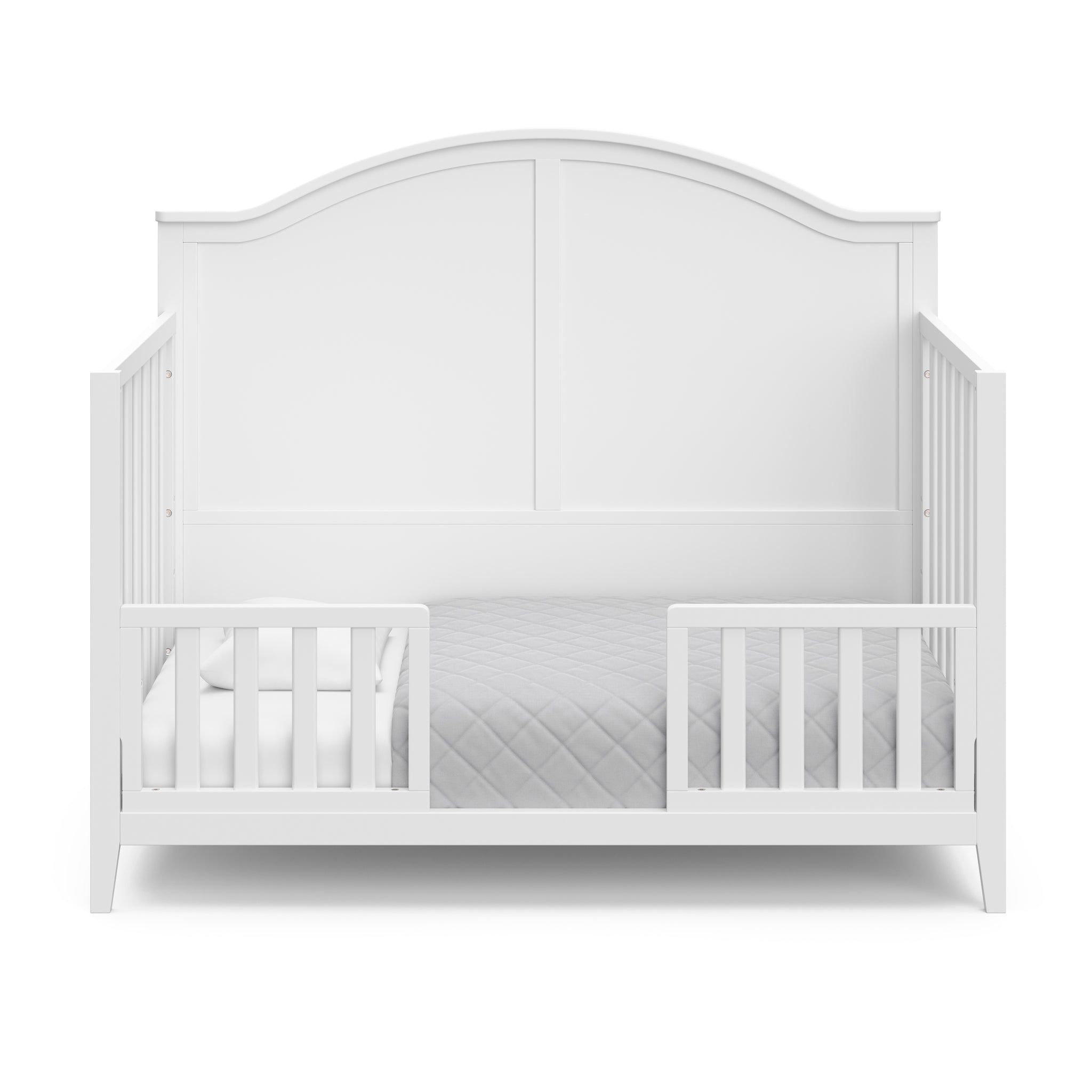 white toddler crib with guardrails
