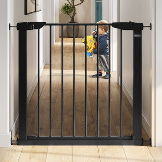 black safety gate installed on wall for toddlers