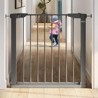 gray safety gate installed on wall for toddlers