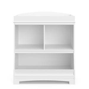 Front view of white changing table with storage