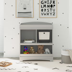 Pebble gray changing table with storage in nursery 