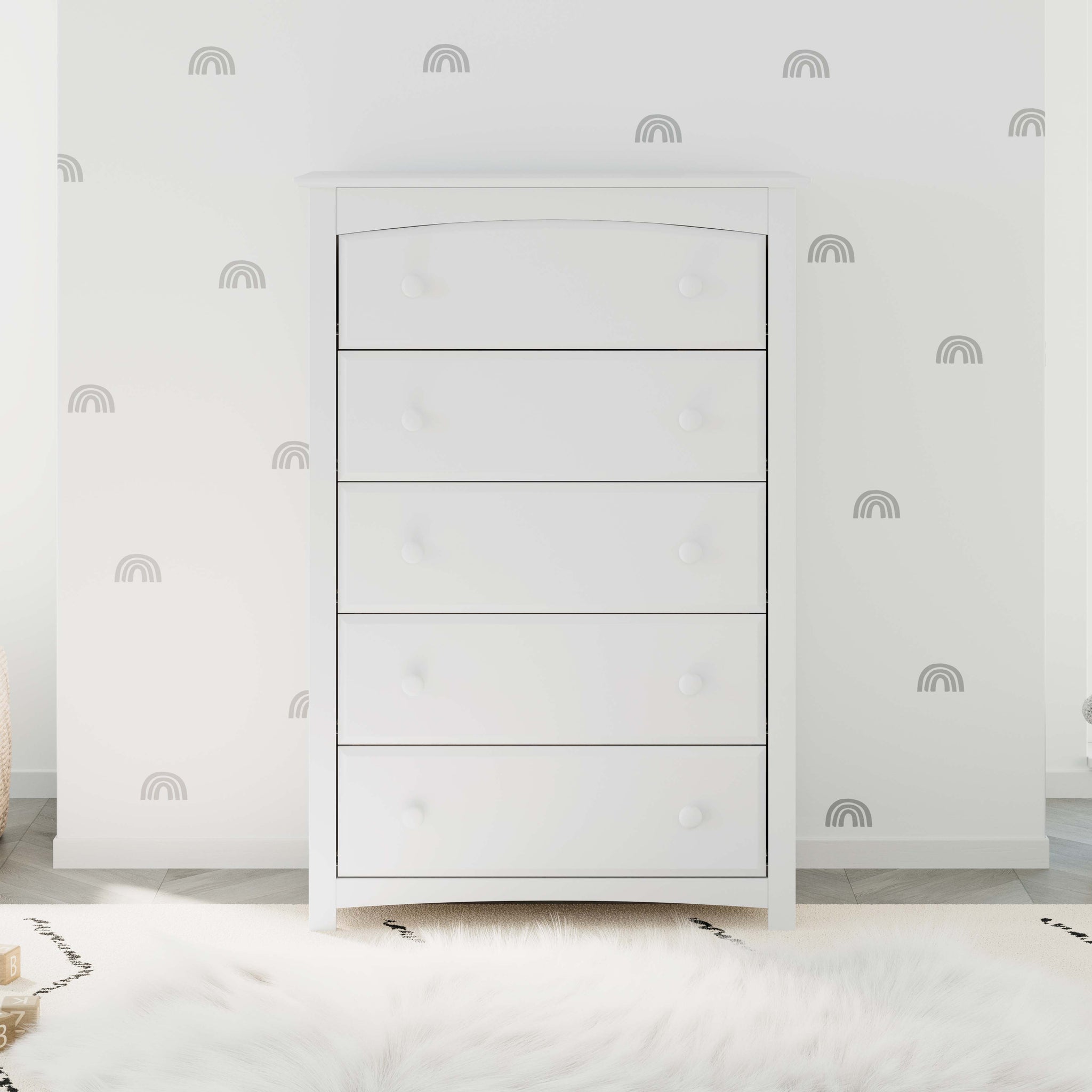 White 5 drawer chest in nursery