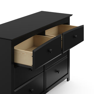 Black 6 drawer dresser with 2 open drawers angled view