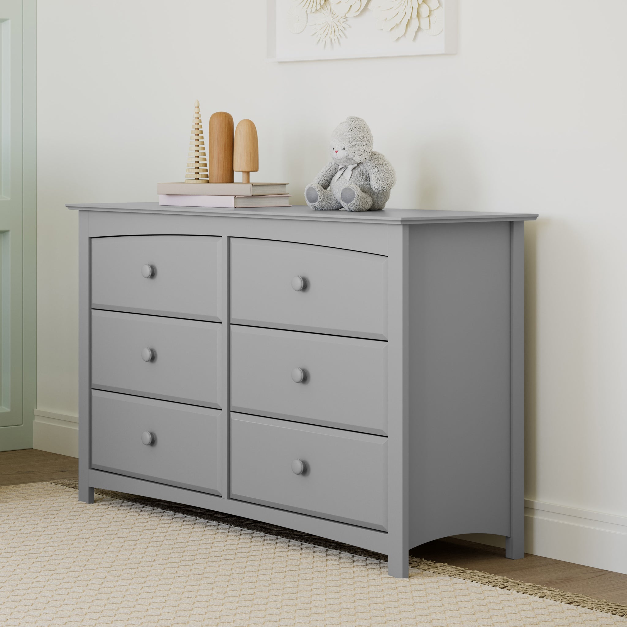 Pebble gray 6 drawer dresser in nursery angled