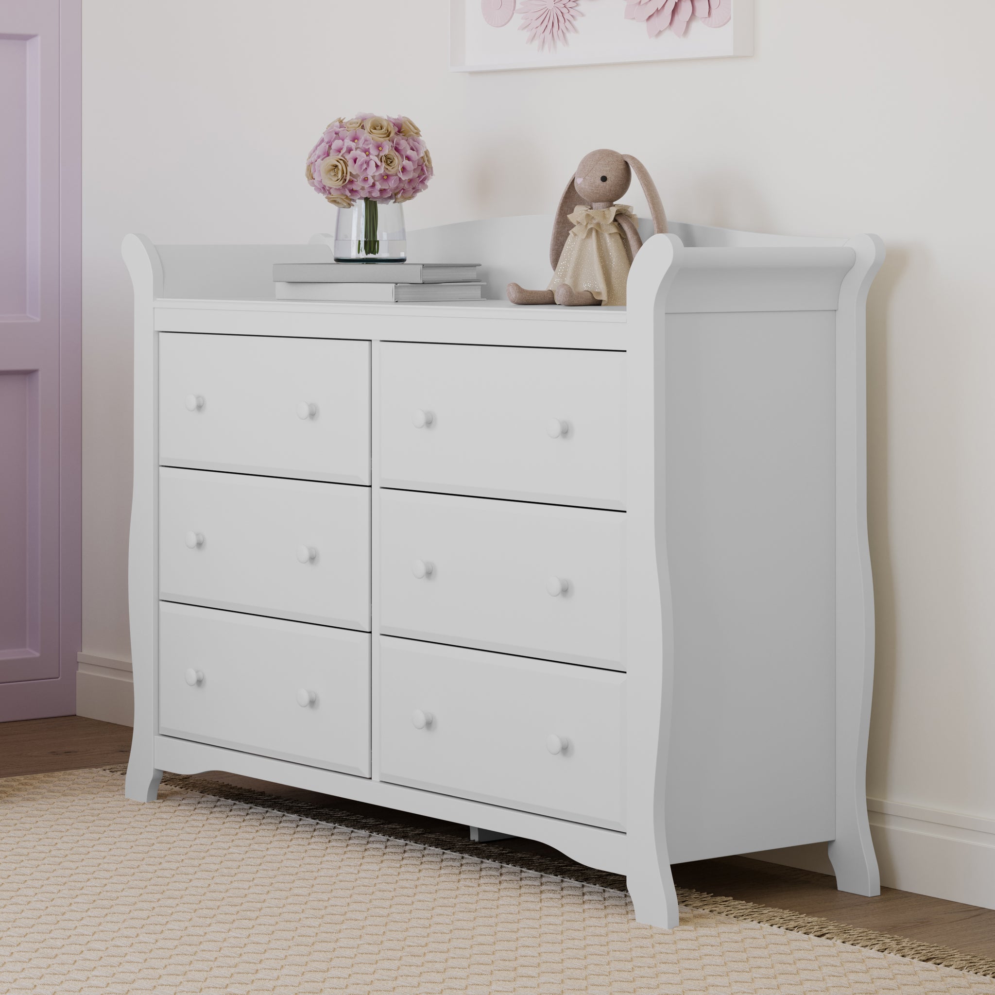 White 6 drawer dresser in nursery