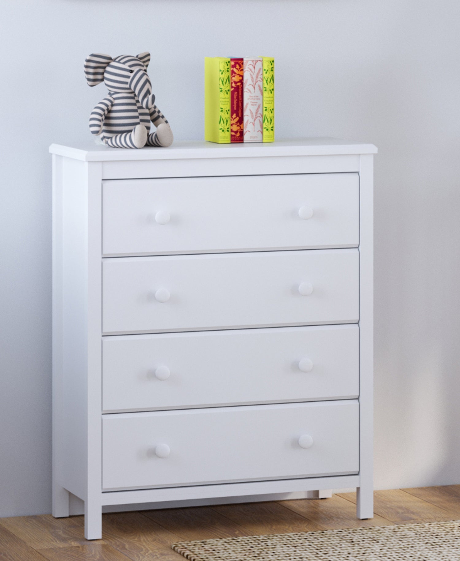 White 4 drawer chest in nursery