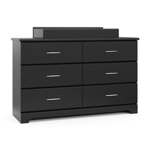 black 6 drawer dresser with changing topper and changing pad