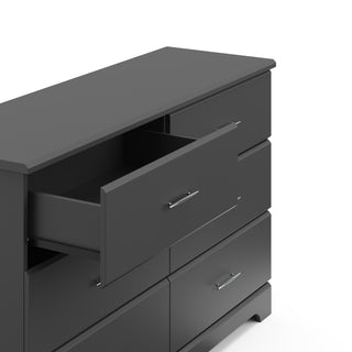 gray 6 drawer dresser with open drawer