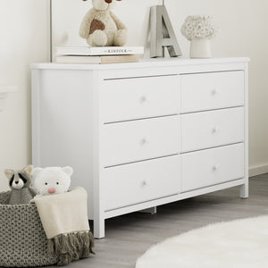 White 6 drawer dresser in nursery