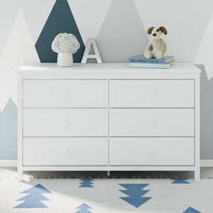 White 6 drawer dresser in nursery