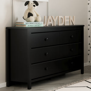 black 6 drawer dresser in nursery