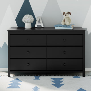 black 6 drawer dresser in nursery