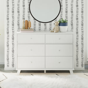 White 6 drawer dresser in nursery