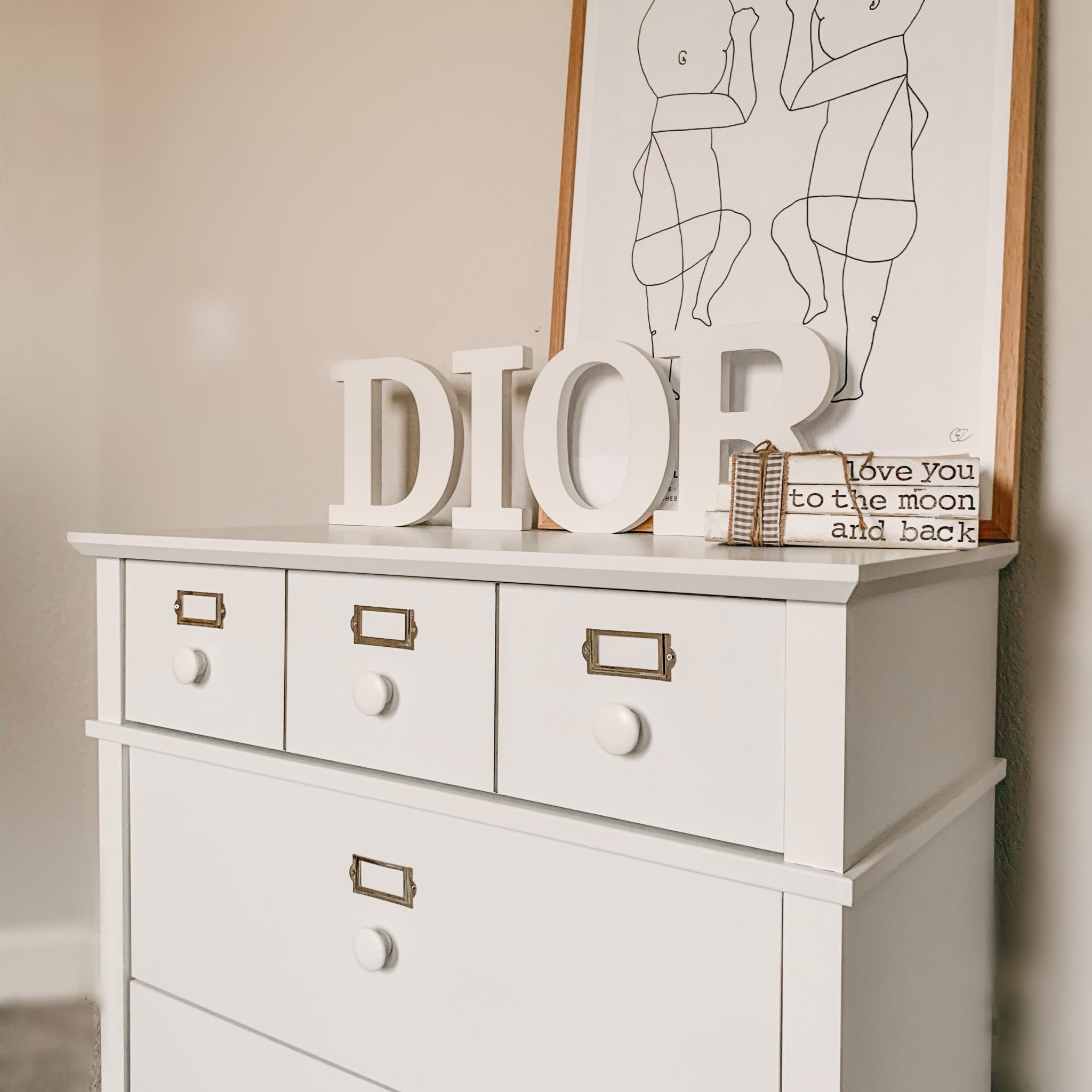 White 3 drawer chest in nursery