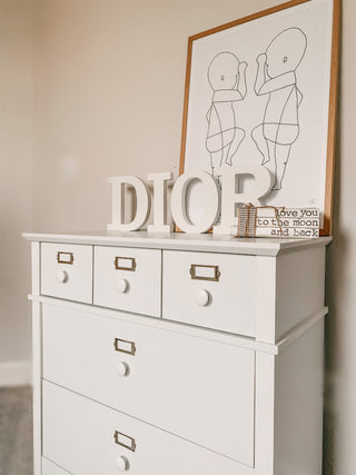 White 3 drawer chest in nursery