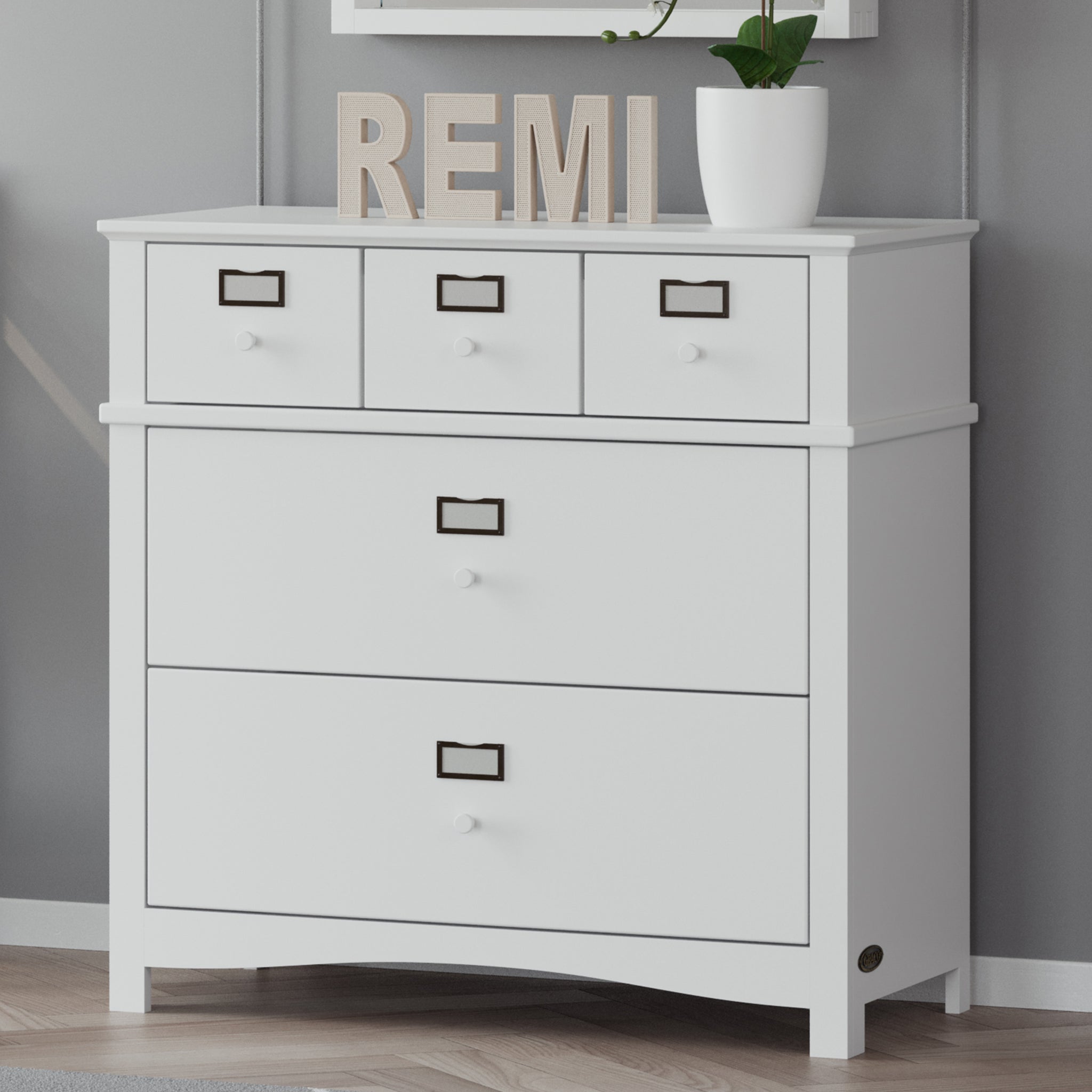 White 3 drawer chest in nursery