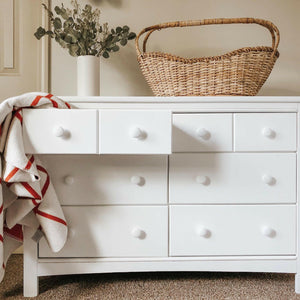 White 6 drawer dresser in nursery