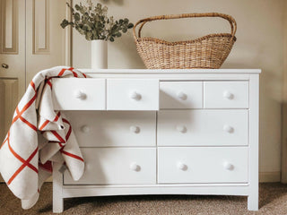 White 6 drawer dresser in nursery