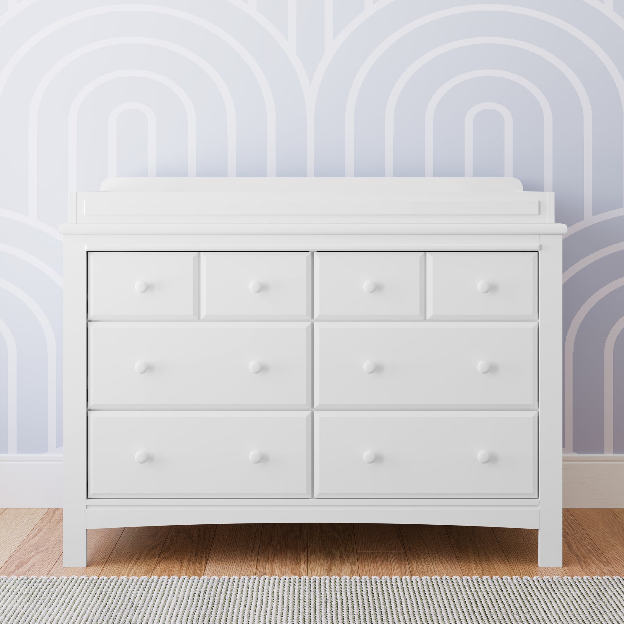 White 6 drawer dresser in nursery